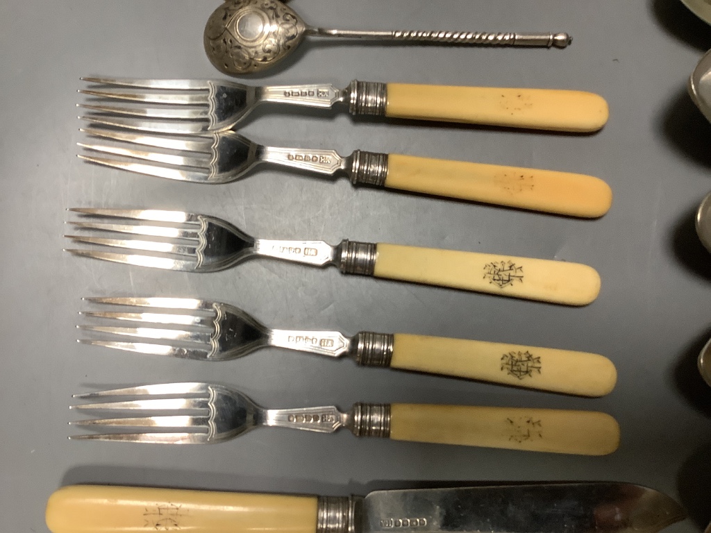 Six pairs of Victorian Ivory handled silver fish eaters and a small quantity of other flatware.